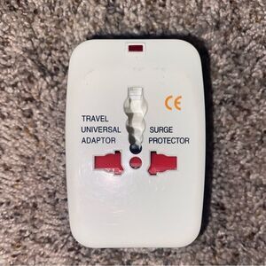 UNIVERSAL TRAVEL OUTLET ADAPTER & SURGE PROTECTOR